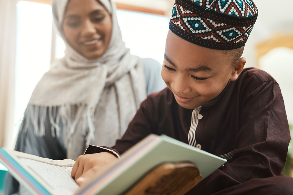 shot-of-a-young-muslim-mother-and-her-son-reading-2022-10-05-04-55-19-utc-copy.jpg